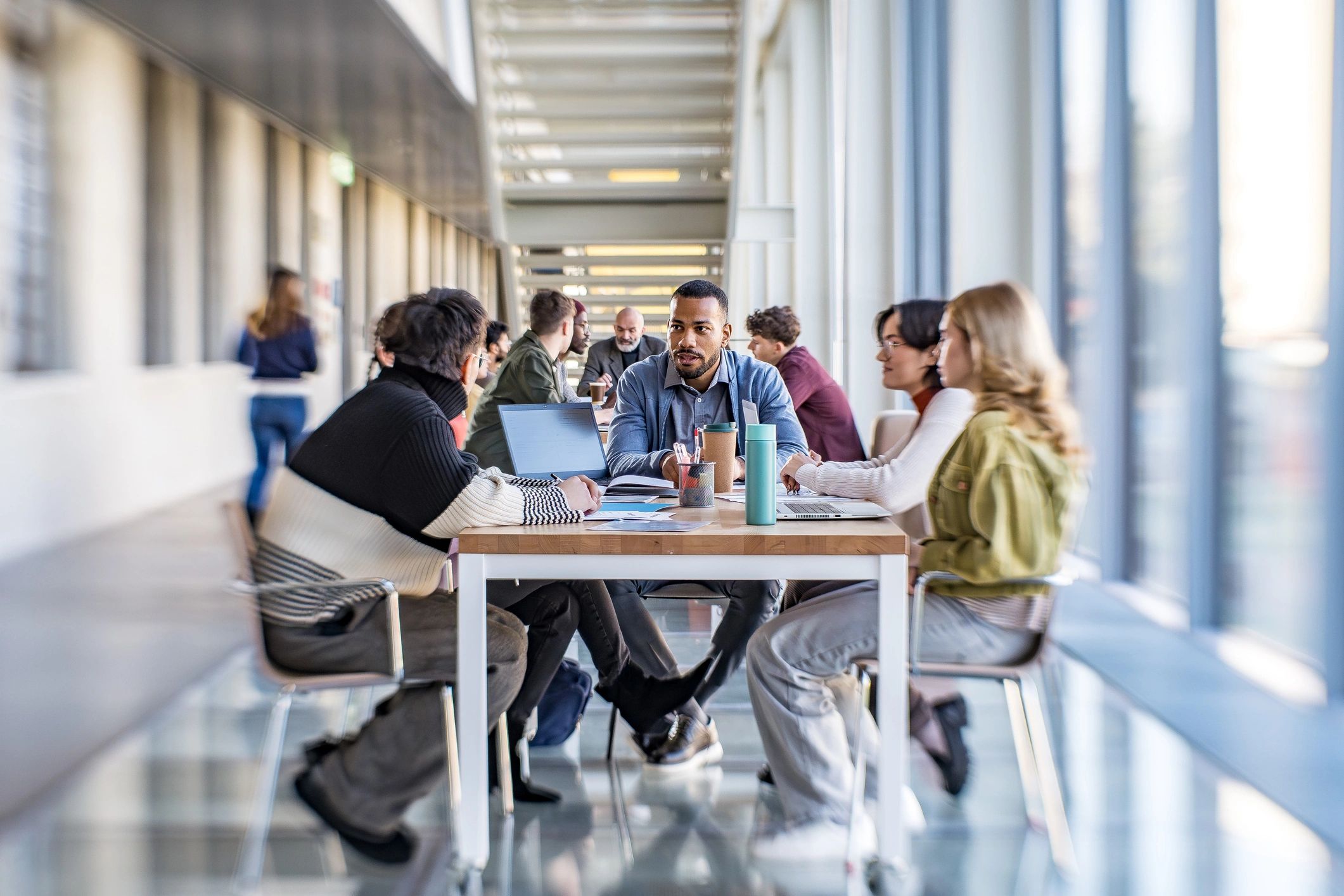 Colleagues brainstorming together in a modern office